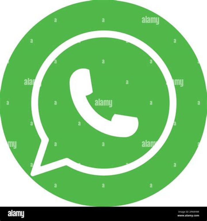 android-authority-whatsapp-hero-image-26 A WhatsApp app icon closeup on a smartphone.