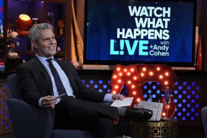 Andy COhen sitting on "WWHL"