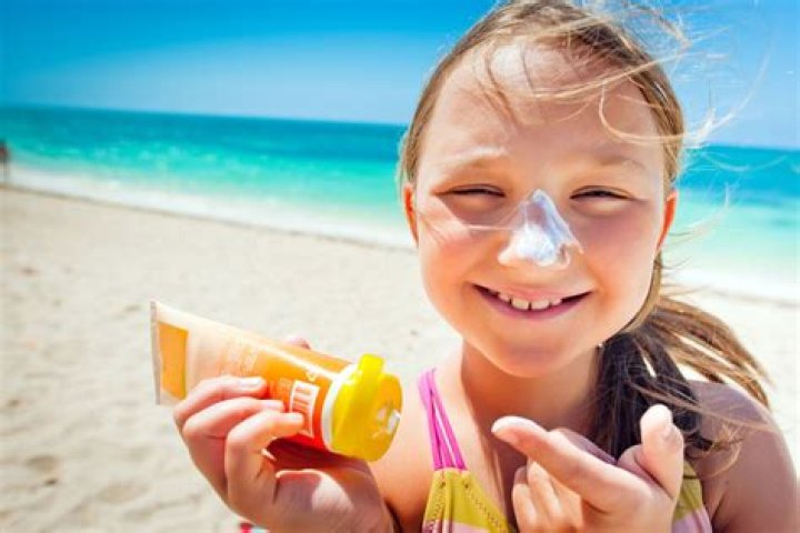 applying sunscreen