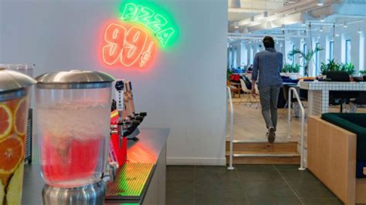 WeWork-4_beer tap kitchen Beer taps in a WeWork with kitchen appliances in the background.
