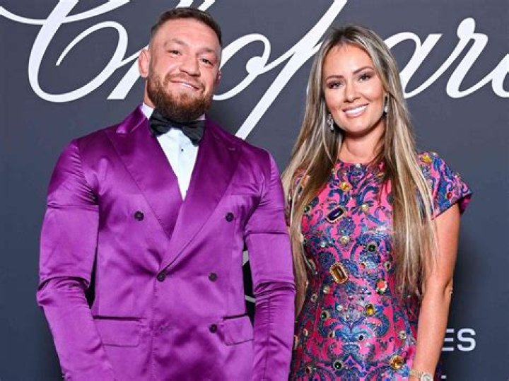 Conor McGregor and Dee Devlin wearing black