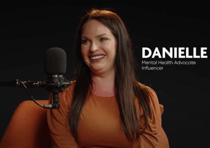Danielle Ruhl talking in her car.