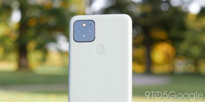 Google Pixel 5 camera selfie 1 outdoor shot of a man with dark hair tied back and facial hair wearing shades and a leather jacket with a white t-shirt.