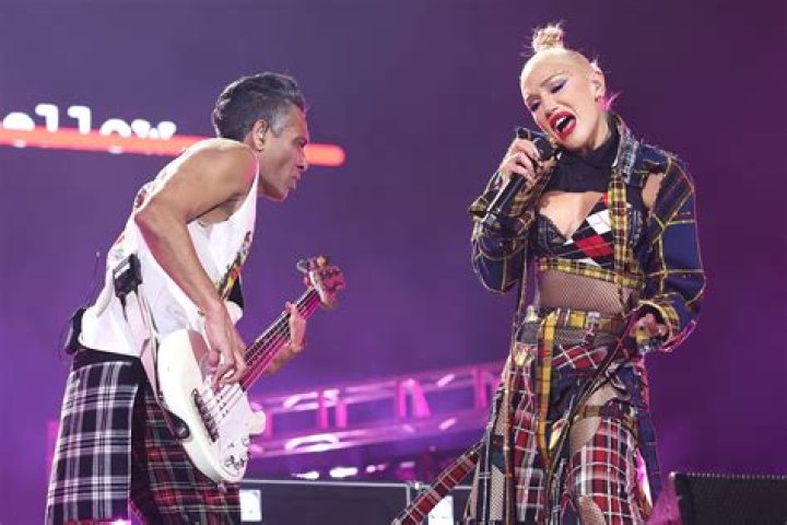 Gwen Stefani looking on