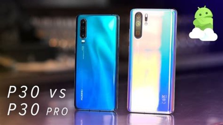 huawei p30 pro vs huawei mate 20 pro held in hand showing displays
