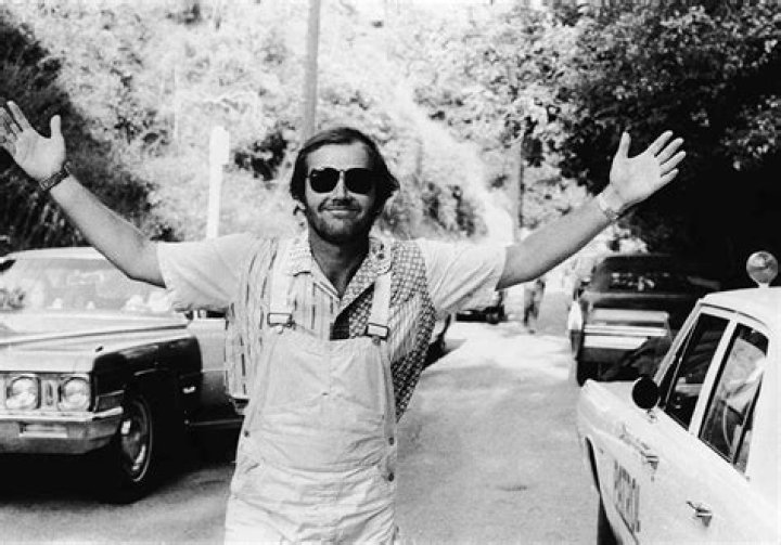 Jack Nicholson posing with arms slightly raised