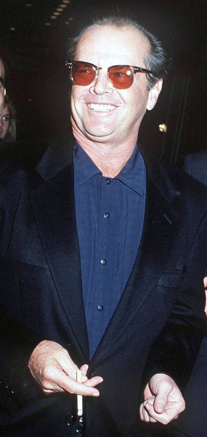 Jack Nicholson wearing red-colored glasses