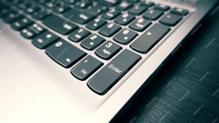 laptop keyboard close-up - Arc launcher not updating