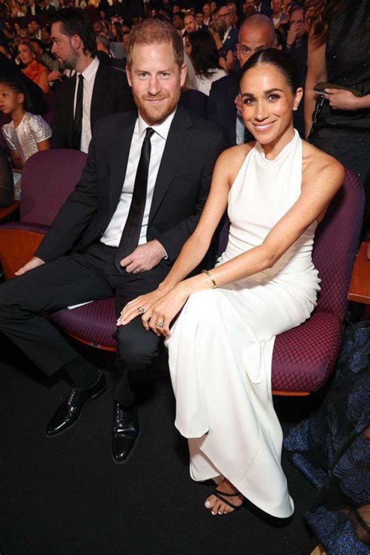 Meghan Markle sitting and staring at an event