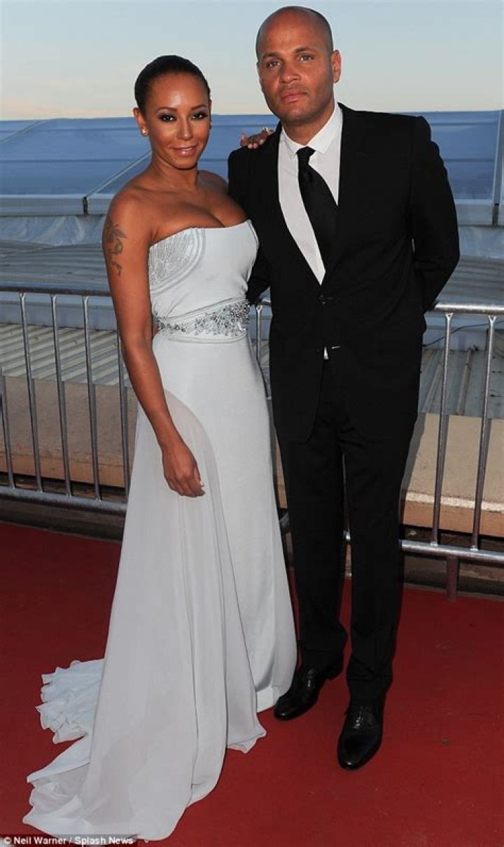 Mel B and Stephen Belafonte smiling on a red carpet