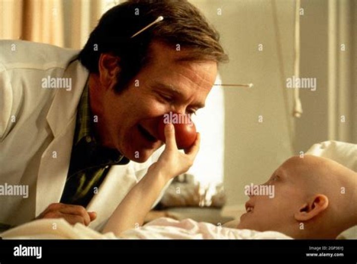PATCH ADAMS, Robin Williams (left), 1998. &copy; Universal Pictures/ Courtesy: Everett Collection
