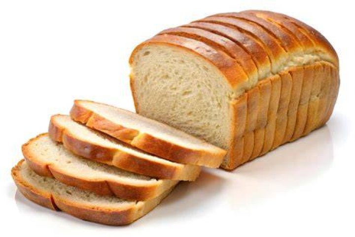 Sliced bread on a white surface Sliced bread on a white surface