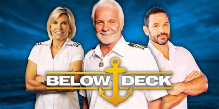 The Below The Deck cast in their red and khaki tan uniforms